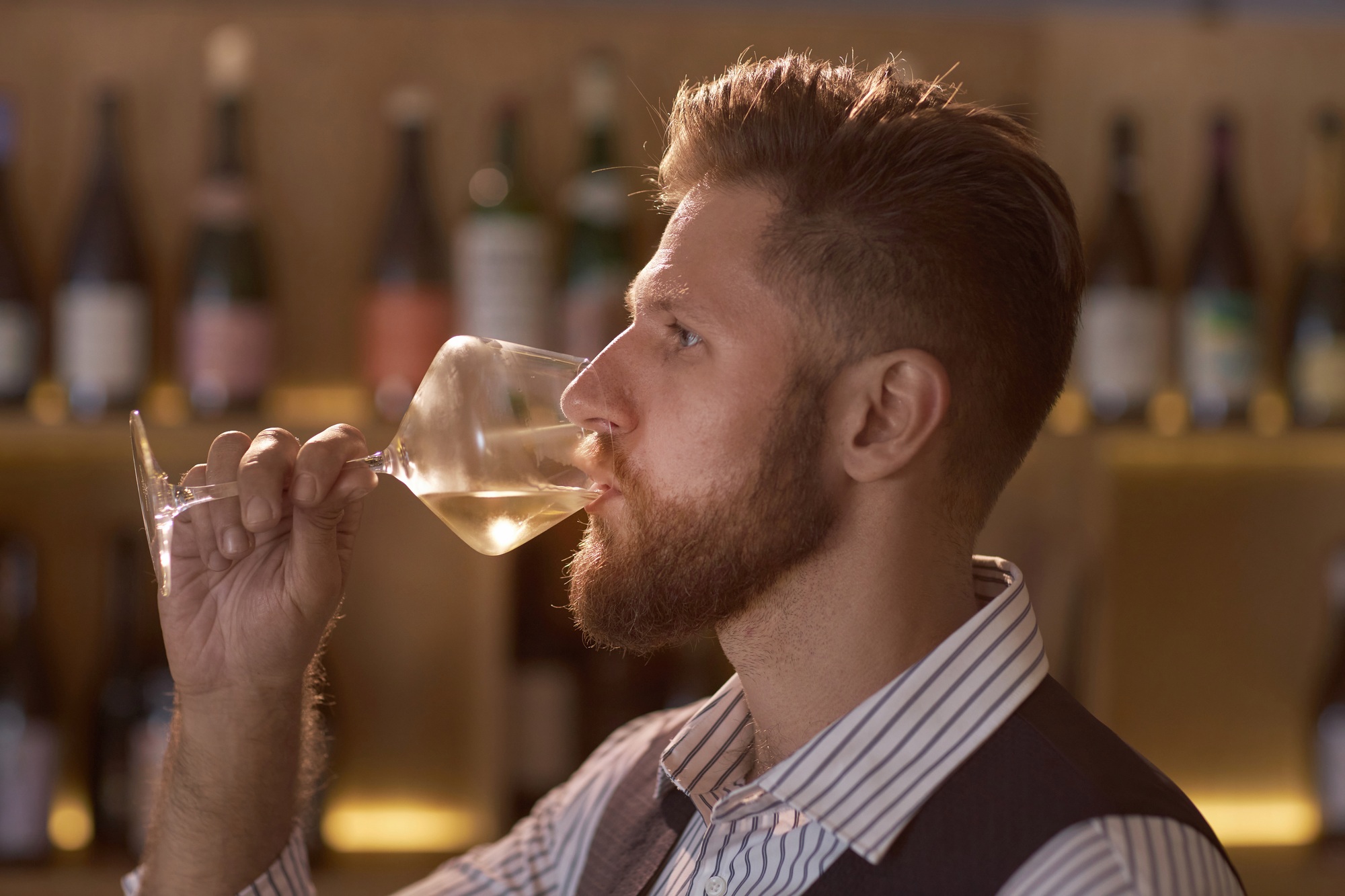 Caucasian Man Drinking Wine